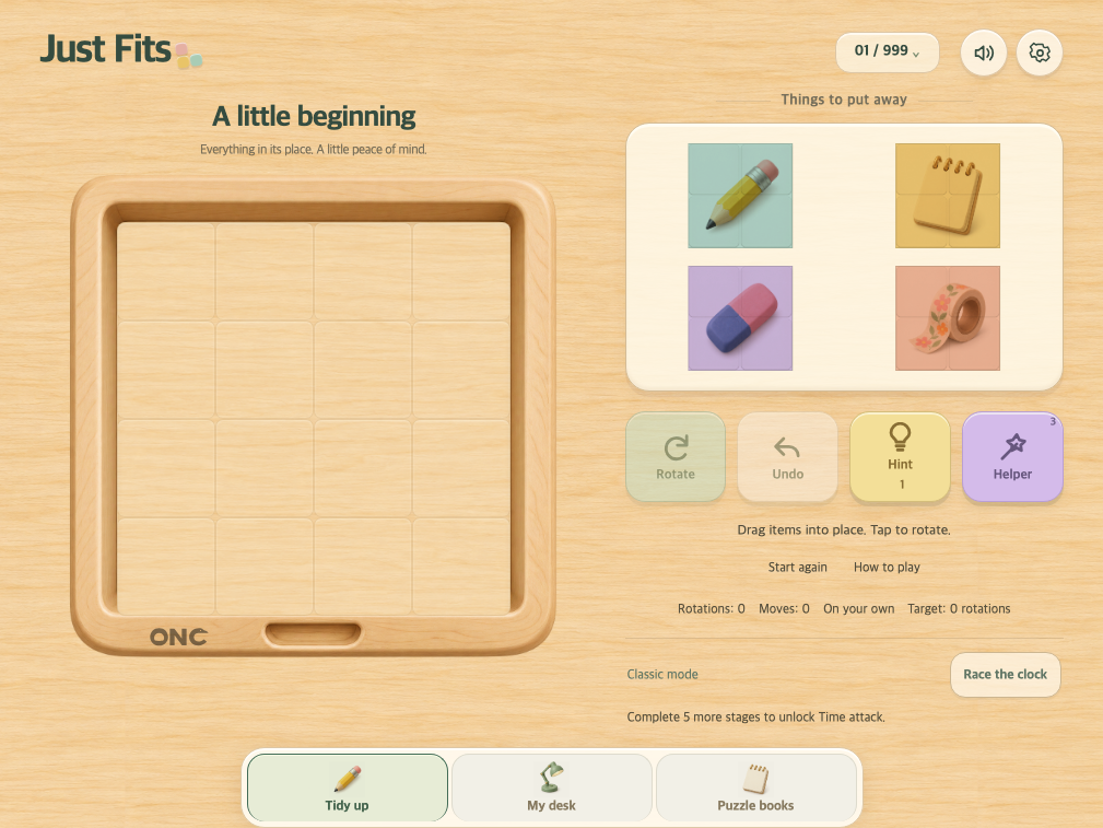 Actual Just Fits development build in English showing an organizing puzzle on a tablet